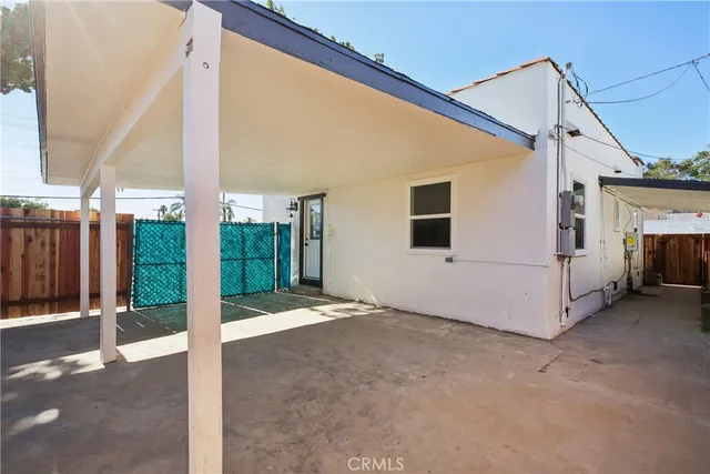 a view of a house with a street