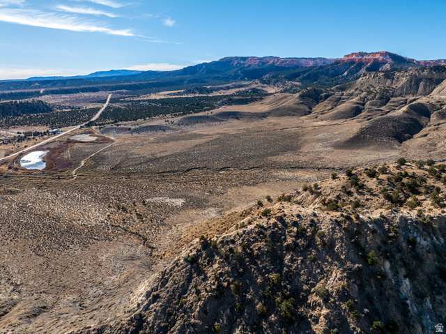 1040 West Under The Rim Road Tropic, UT 84776 - Photo 20 of 21 Expansive desert landscape featuring rugged terrain and distant mountain ranges