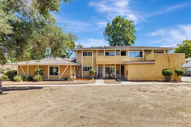 front view of a house with a patio