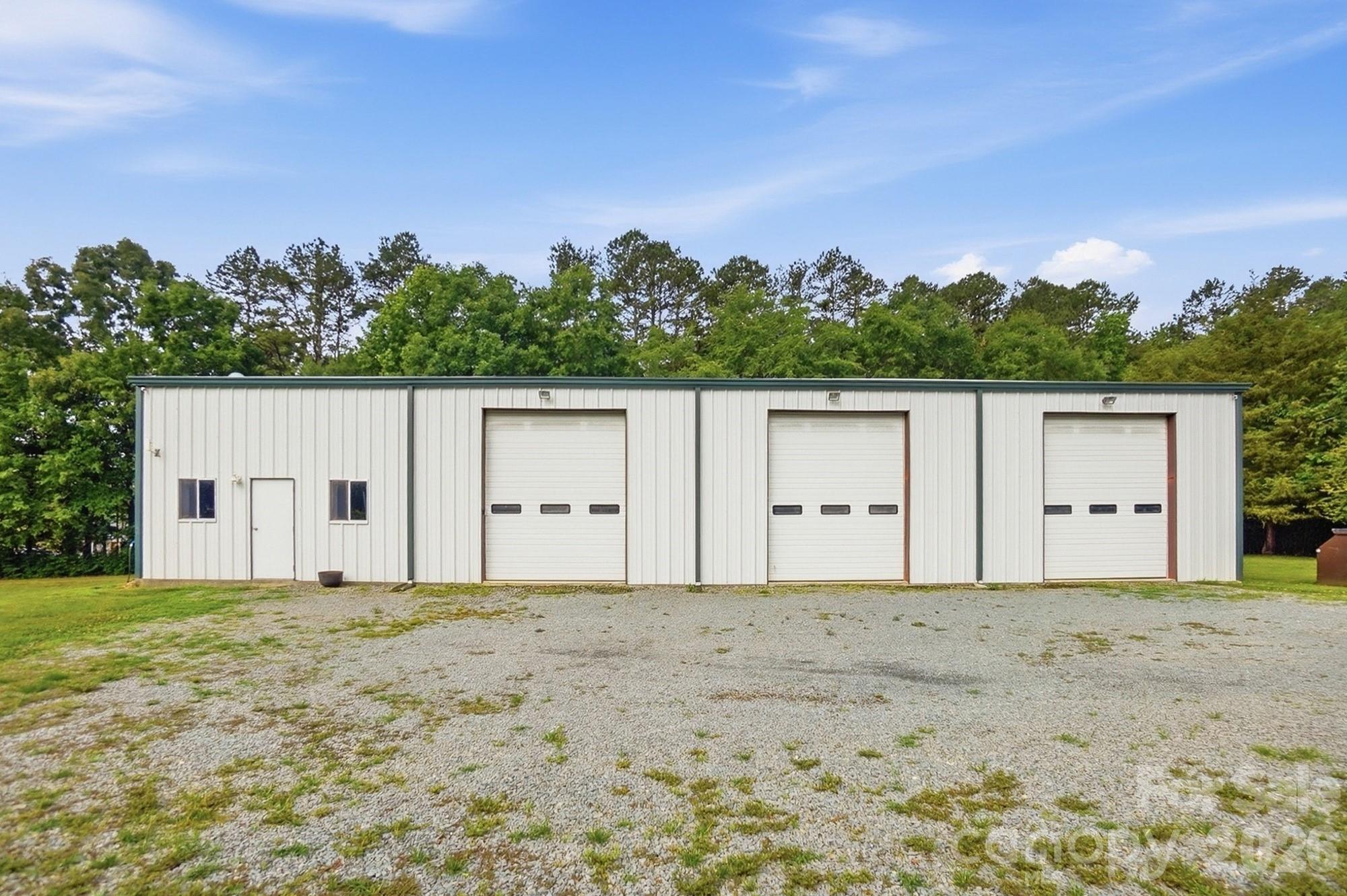 4017 Mullis Newsome Road Monroe, NC 28110 - Photo 35 of 38 a view of a house with a yard