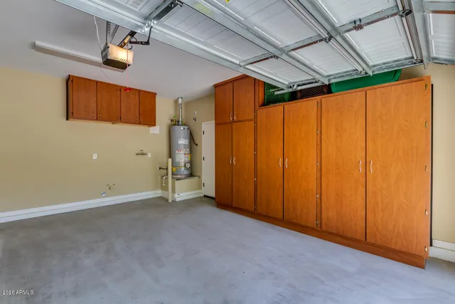 an empty room with wooden walls