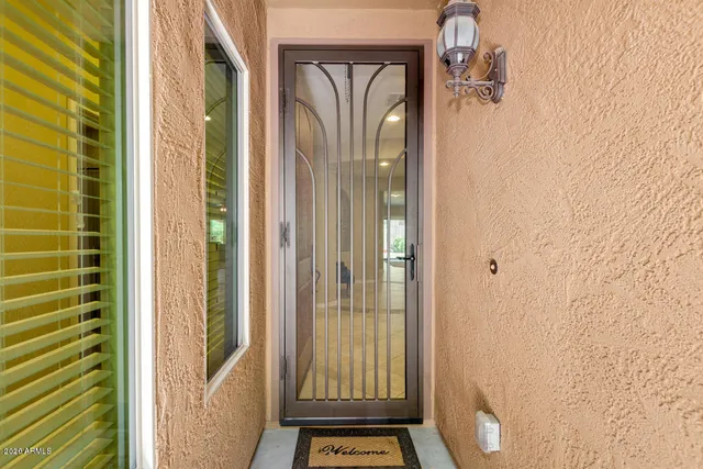 a view of a bathroom with a glass door