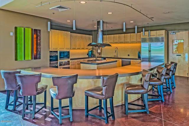 a view of a dining room with furniture and window