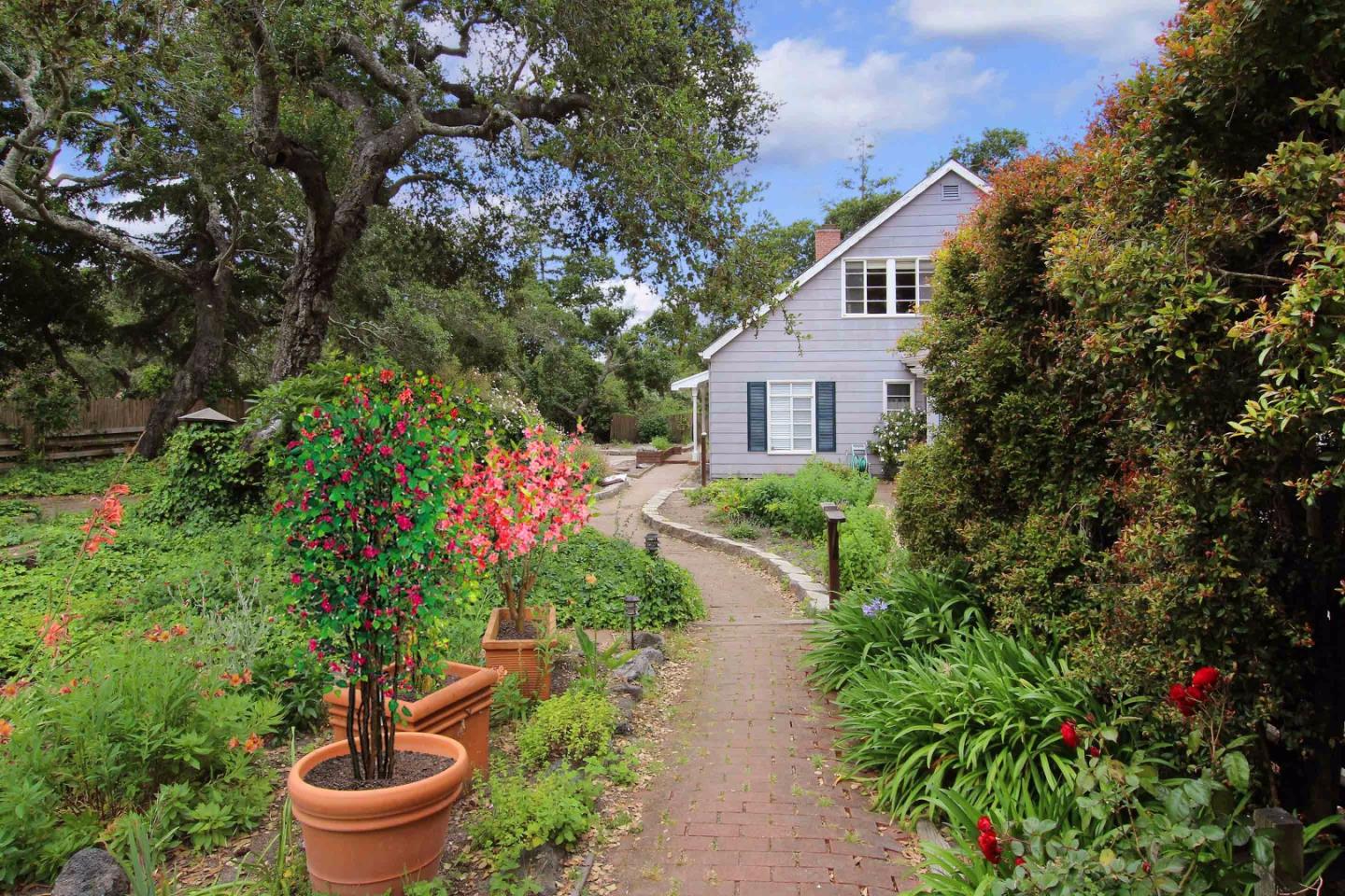 21 Oak Road Santa Cruz, CA 95060 - Photo 14 of 25 a front view of a house with a yard and fountain
