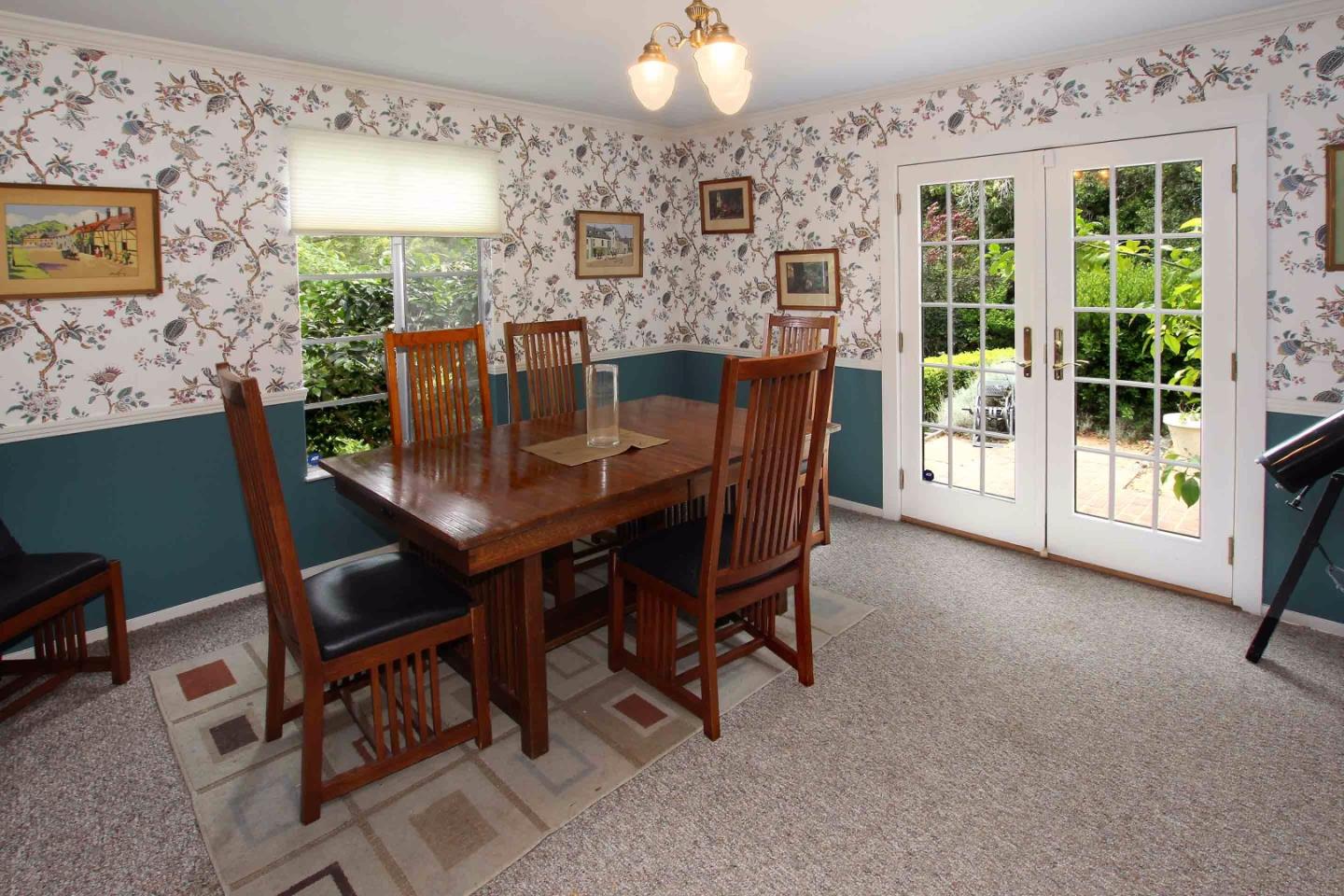 21 Oak Road Santa Cruz, CA 95060 - Photo 6 of 25 a view of a dining room with furniture and a large window
