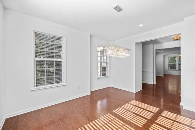 a kitchen that has a sink and a stove
