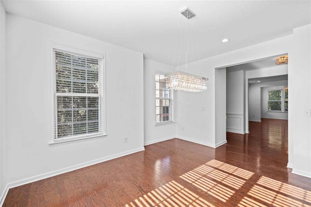 4228 Laurel Creek Court Southeast, Unit 6 Smyrna, GA 30080 - Photo 14 of 59 a view of a room with wooden floor and windows