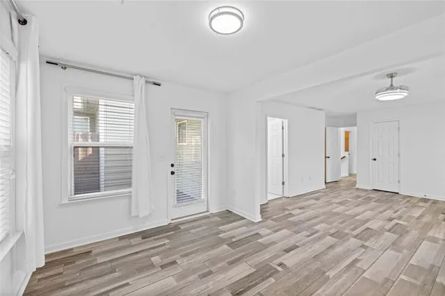 a bathroom with a granite countertop sink a vanity and a mirror