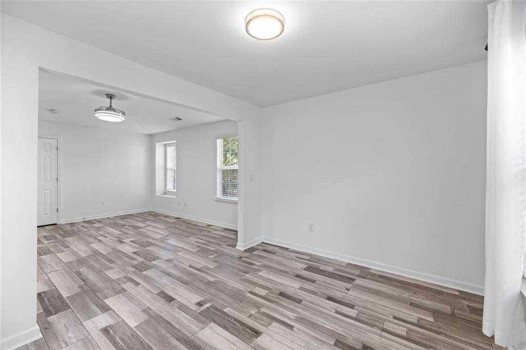 4228 Laurel Creek Court Southeast, Unit 6 Smyrna, GA 30080 - Photo 30 of 59 a view of a room with window and hardwood floor