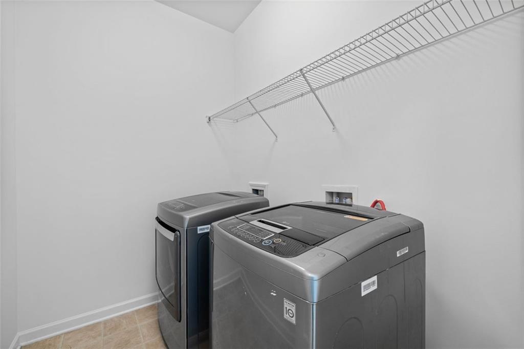 4228 Laurel Creek Court Southeast, Unit 6 Smyrna, GA 30080 - Photo 36 of 59 a utility room with dryer and washer