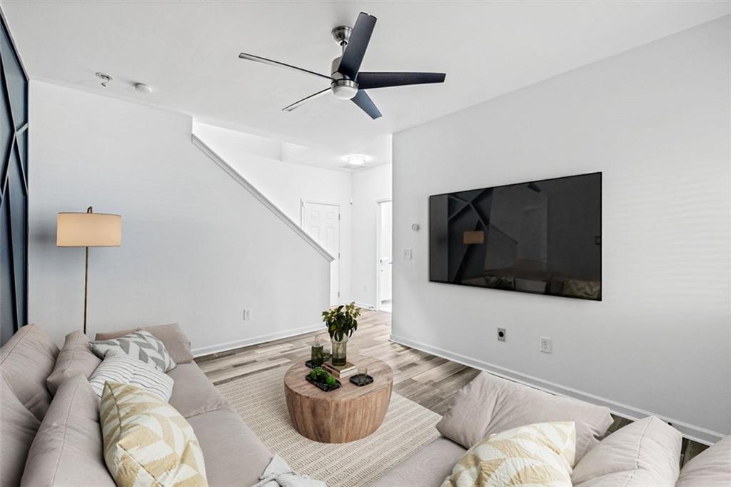 4228 Laurel Creek Court Southeast, Unit 6 Smyrna, GA 30080 - Photo 48 of 59 a living room with furniture and a flat screen tv