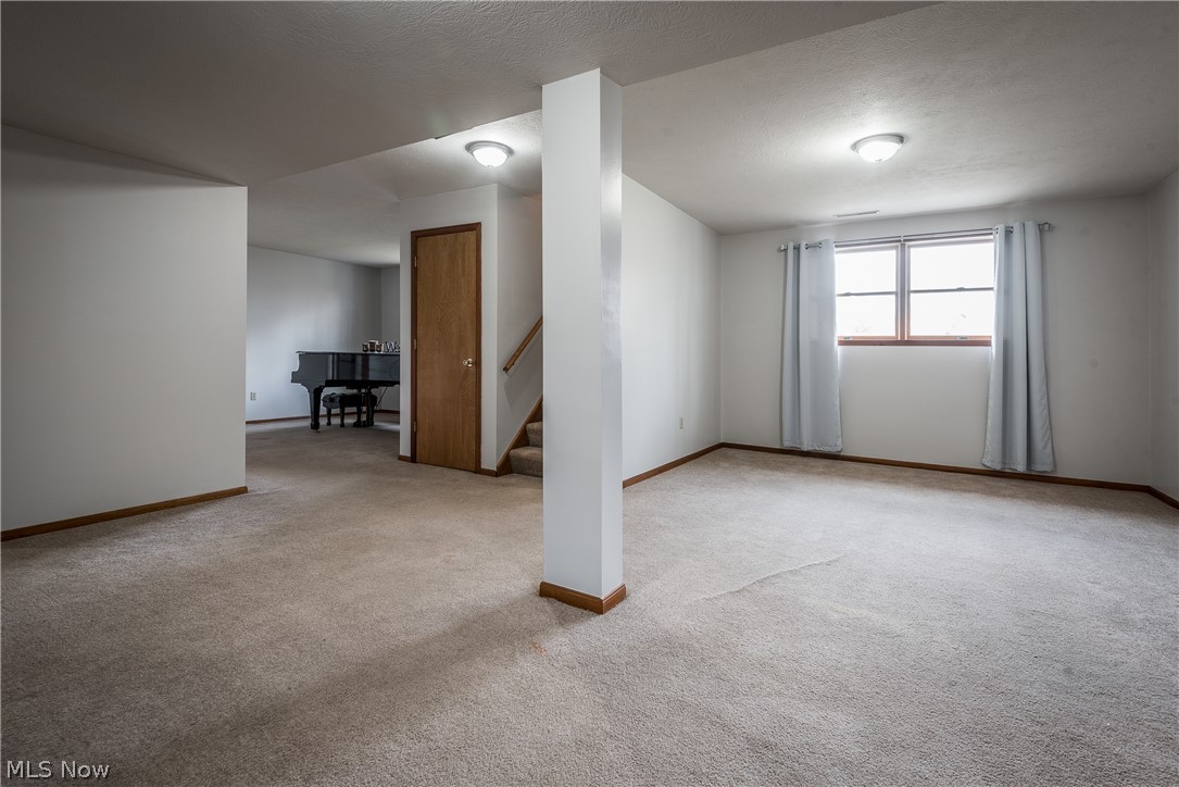 5224 Desert Road Southwest Carrollton, OH 44615 - Photo 23 of 35 CHECK OUT THIS GREAT SPACE IN THE LOWER LEVEL! BRING YOUR GAME TABLES!