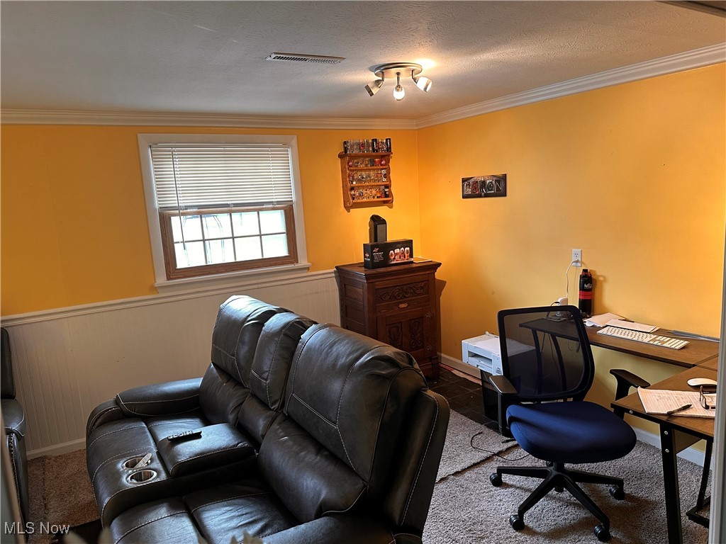 4034 Meister Road Lorain, OH 44053 - Photo 6 of 15 Office with a wainscoted wall, crown molding, and a textured ceiling