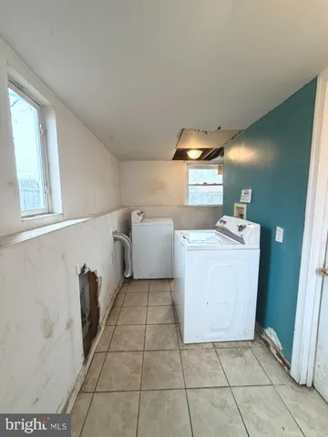 a utility room with a washer and dryer