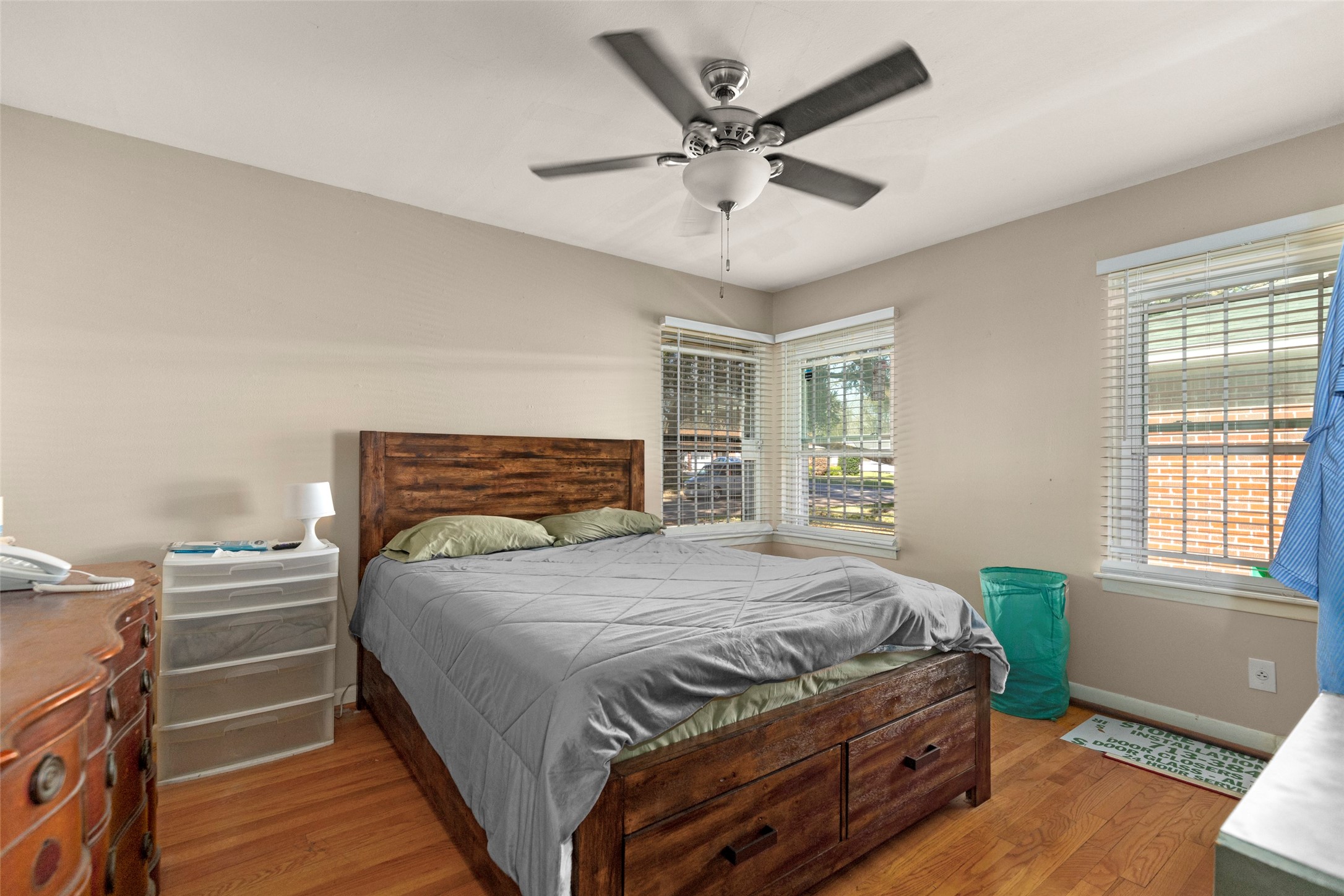 4709 Sanford Road Houston, TX 77035 - Photo 11 of 19 a bedroom with a large bed and a window