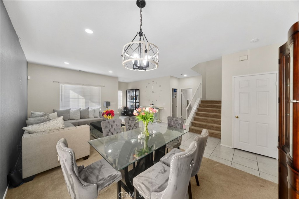 1494 Rabbit Peak Way Hemet, CA 92545 - Photo 9 of 45 a view of a dining room with furniture