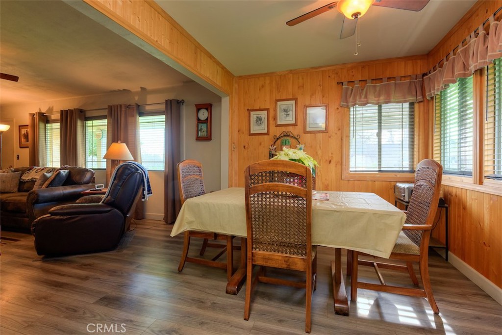 23256 Richfield Road Corning, CA 96021 - Photo 9 of 60 a view of a dining room with furniture window and wooden floor