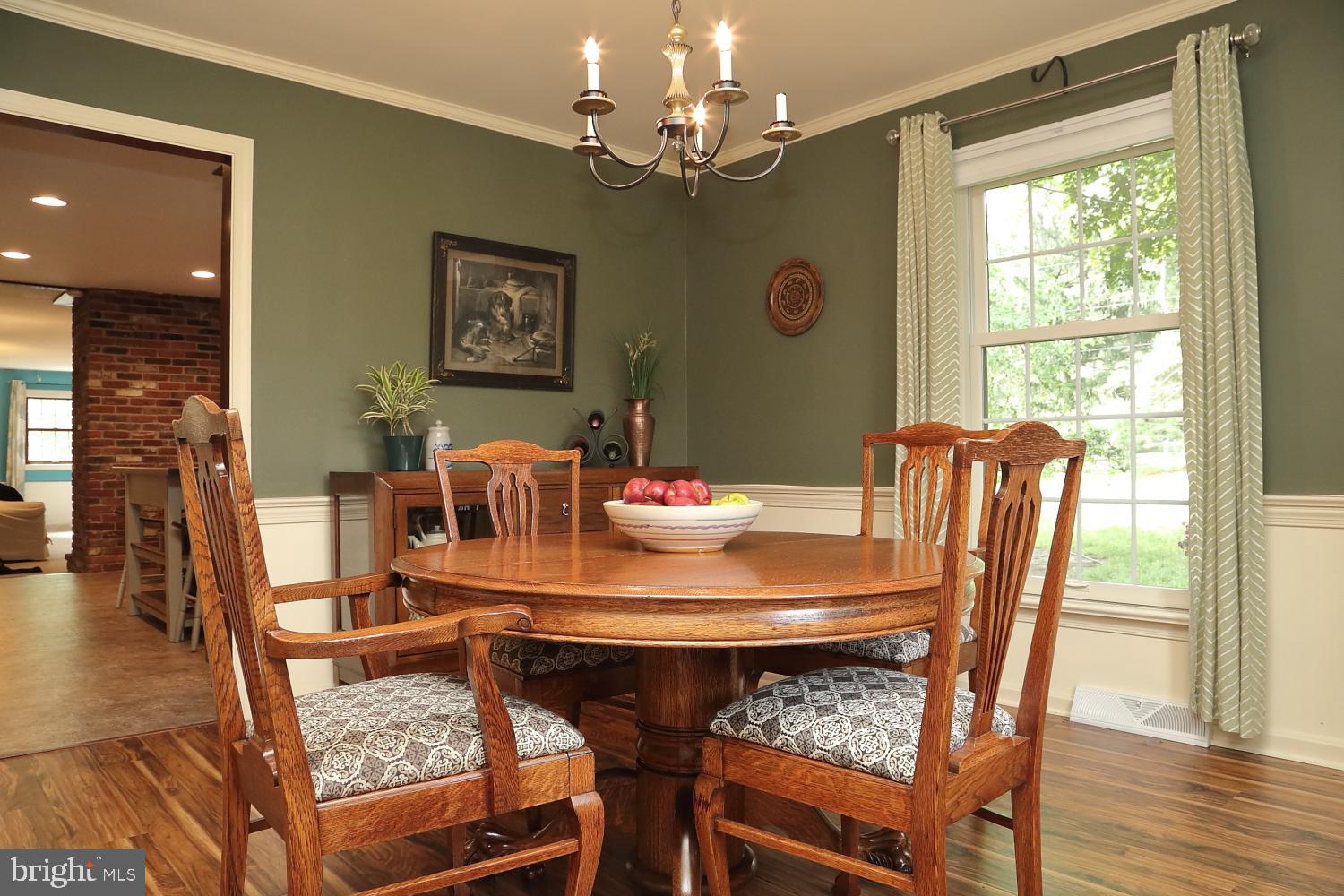 235 St Thomas Road Lancaster, PA 17601 - Photo 3 of 32 a view of a dining room with furniture window and wooden floor
