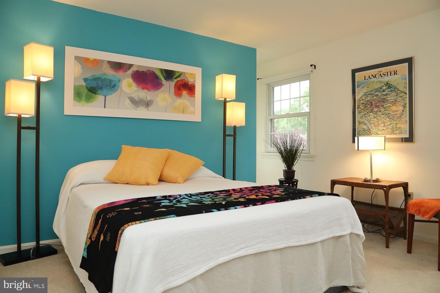 235 St Thomas Road Lancaster, PA 17601 - Photo 29 of 32 a bedroom with bed and wall paintings