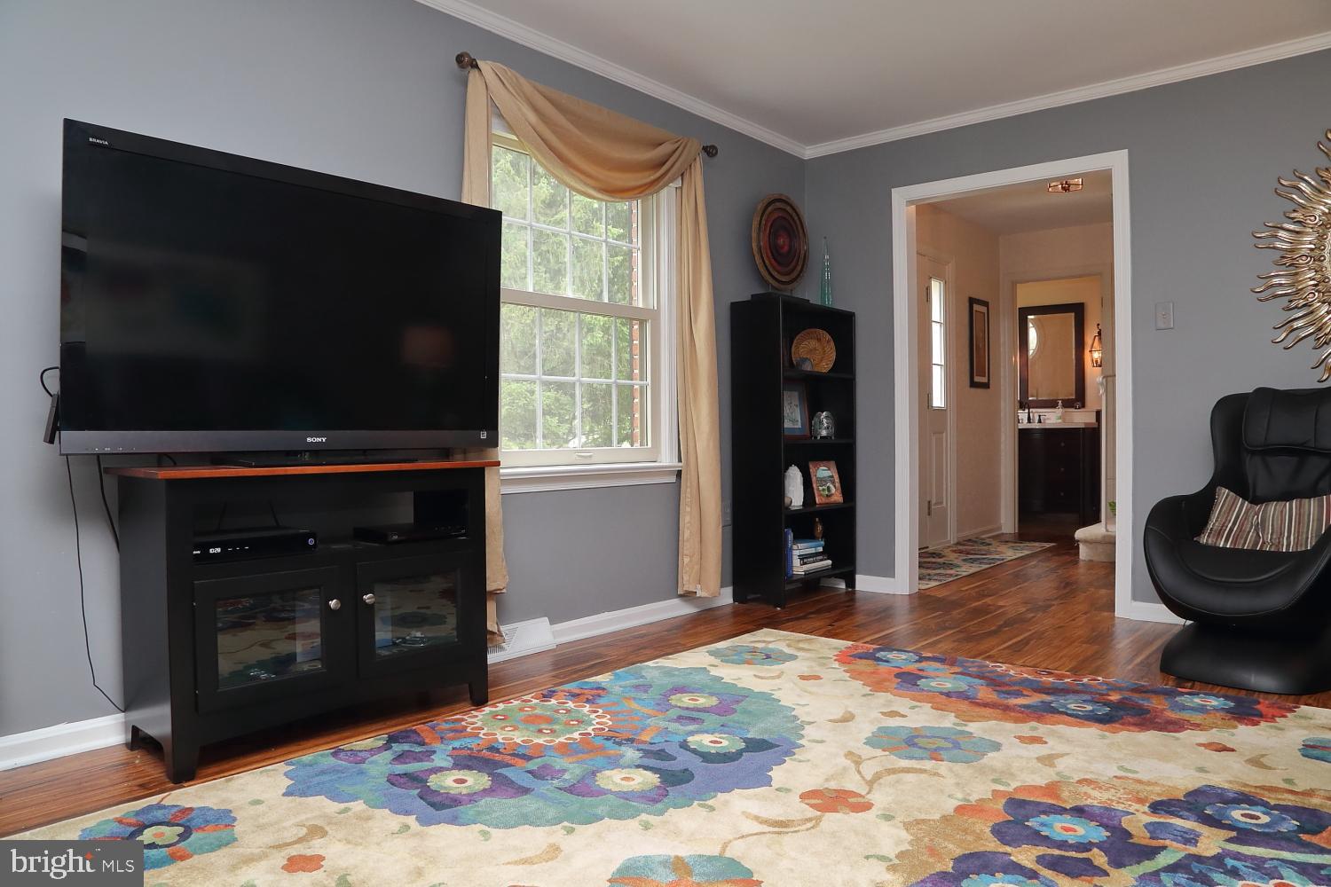 235 St Thomas Road Lancaster, PA 17601 - Photo 8 of 32 a living room with furniture and a flat screen tv