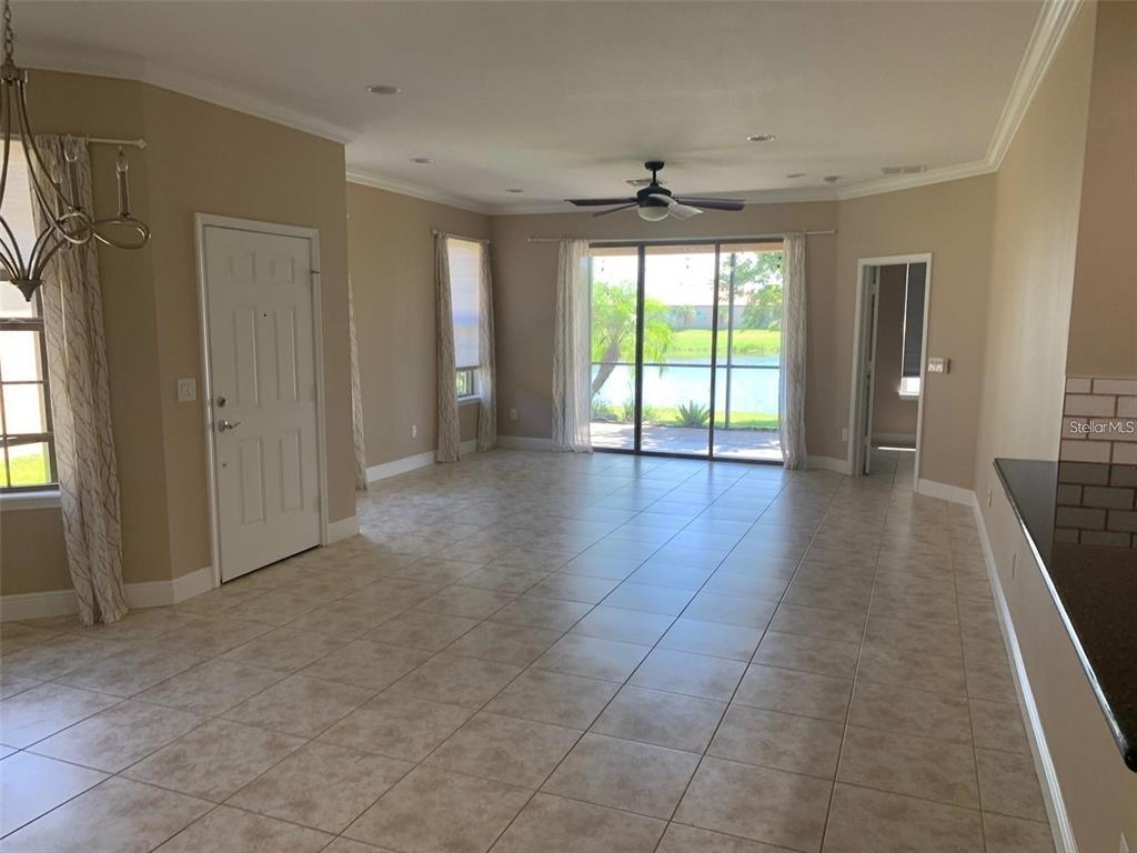 5409 Sunset Falls Drive Apollo Beach, FL 33572 - Photo 11 of 46 a view of a livingroom with wooden floor and a window