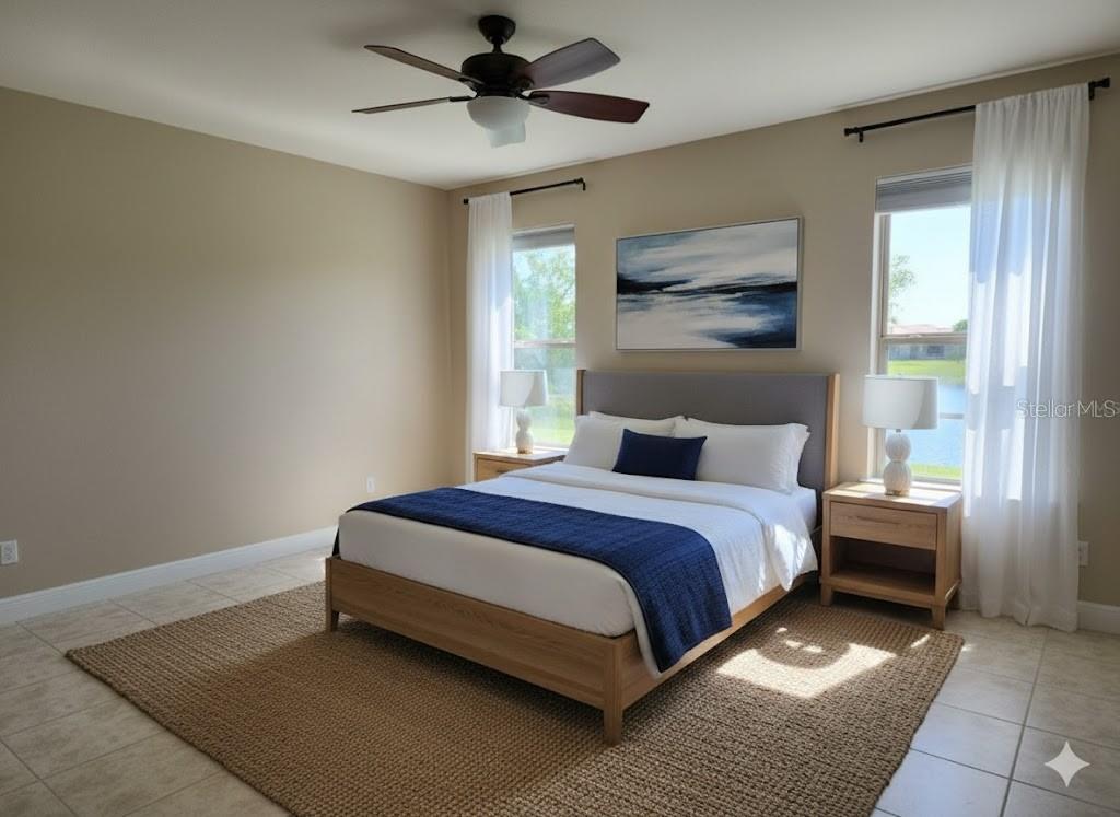 5409 Sunset Falls Drive Apollo Beach, FL 33572 - Photo 16 of 46 a spacious bedroom with a bed and a window