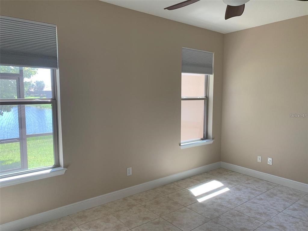 5409 Sunset Falls Drive Apollo Beach, FL 33572 - Photo 17 of 46 an empty room with a window