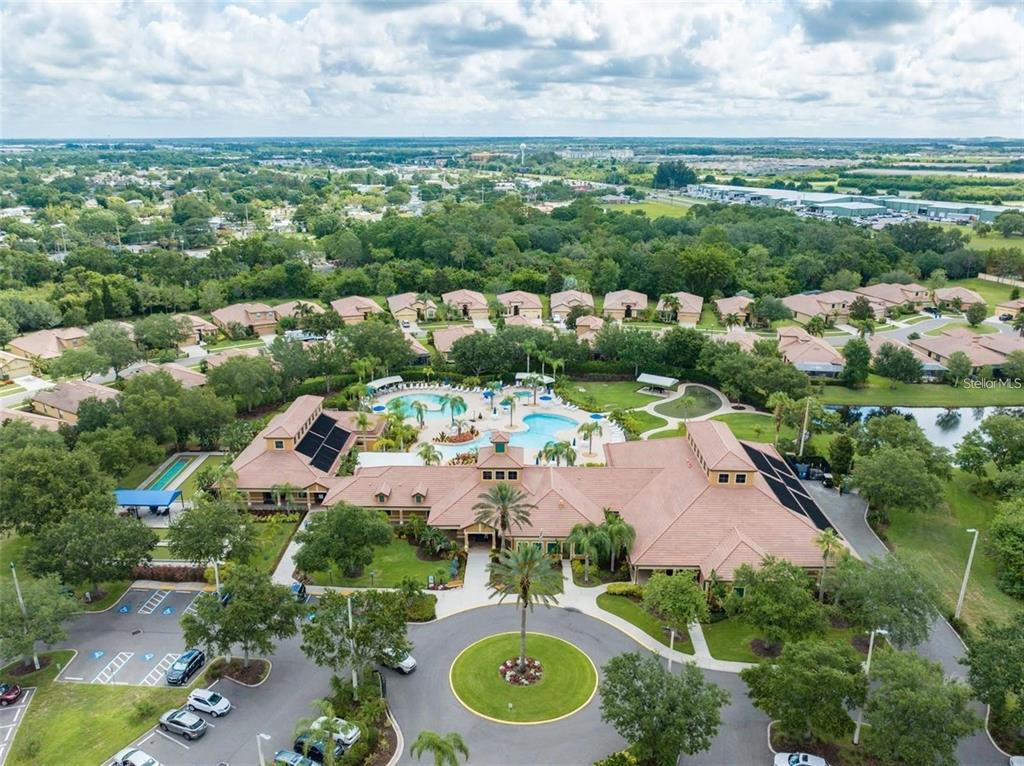 5409 Sunset Falls Drive Apollo Beach, FL 33572 - Photo 39 of 46 an aerial view of a house with garden space and outdoor space