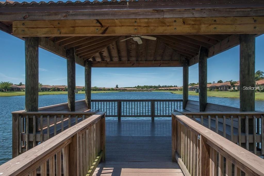 5409 Sunset Falls Drive Apollo Beach, FL 33572 - Photo 43 of 46 a view of a balcony with wooden floor