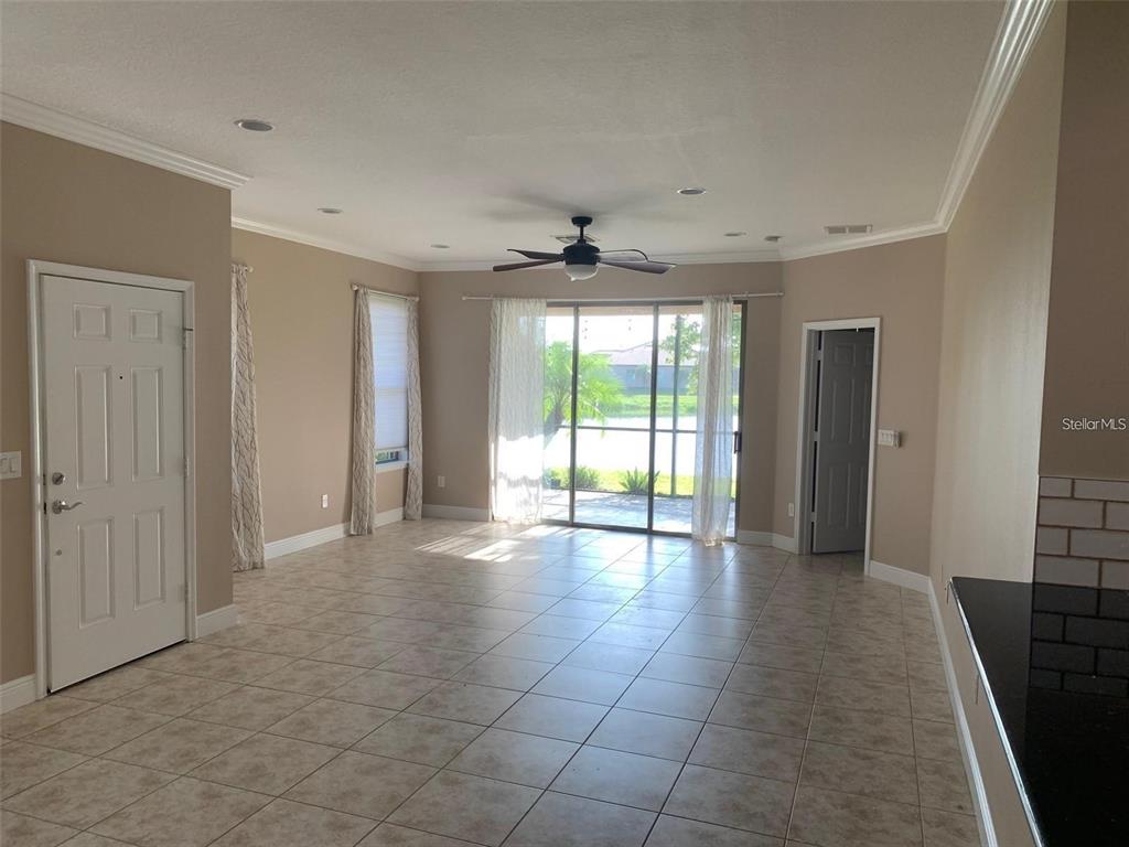 5409 Sunset Falls Drive Apollo Beach, FL 33572 - Photo 8 of 46 a view of an empty room with a window