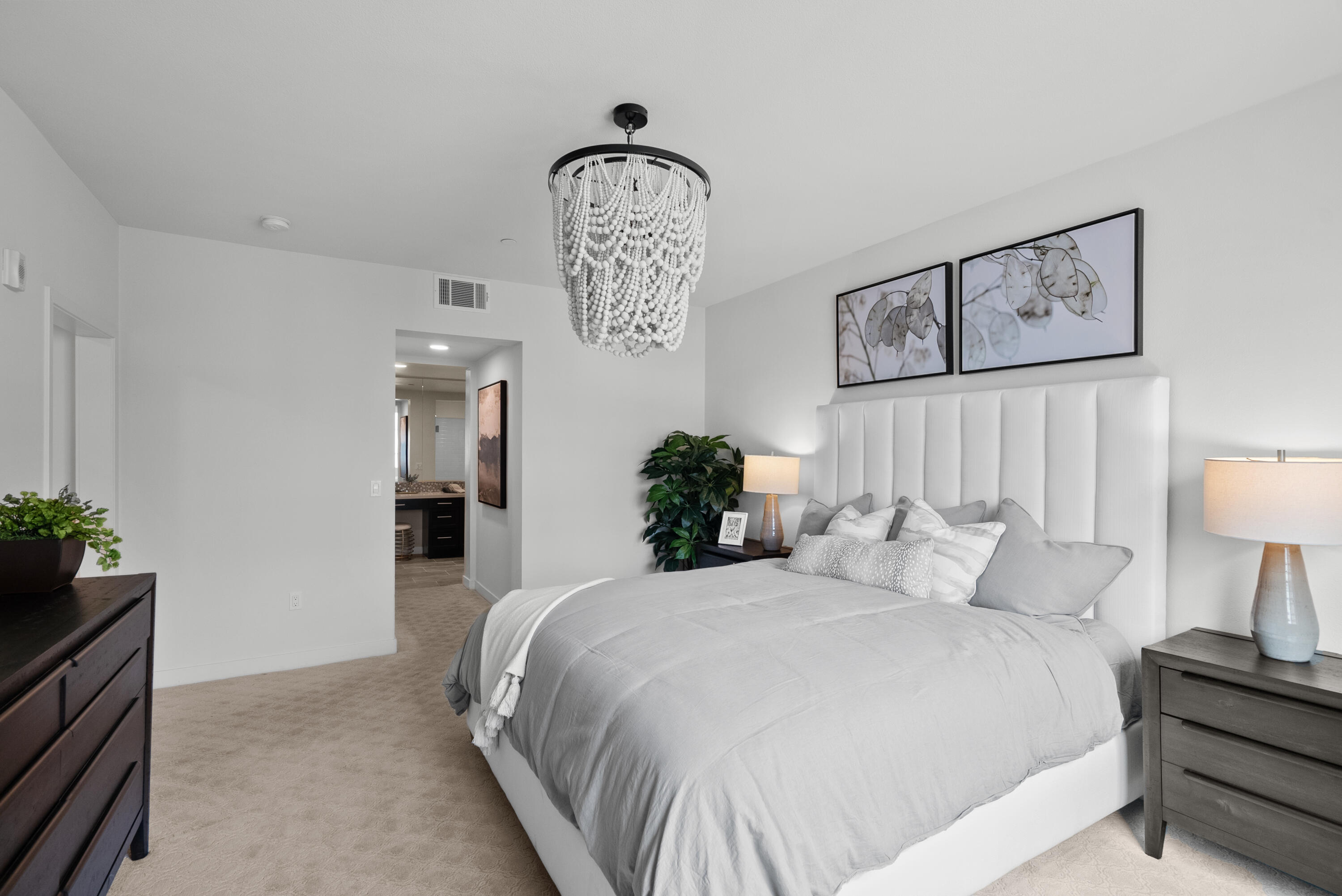 2840 Wagon Wheel Road, Unit 403 Oxnard, CA 93036 - Photo 13 of 23 a bedroom with a bed and a lamp