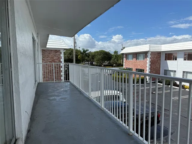 a view of a building from a balcony