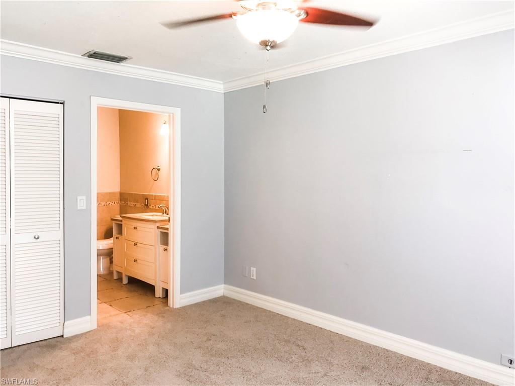 157 Wading Bird Circle, Unit K205 Naples, FL 34110 - Photo 14 of 22 a view of an empty room