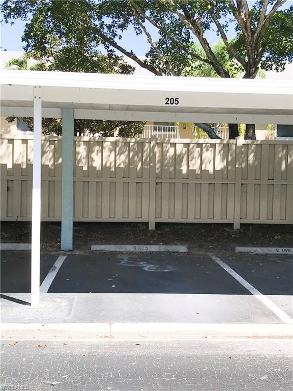 157 Wading Bird Circle, Unit K205 Naples, FL 34110 - Photo 20 of 22 a view of outdoor space with a street