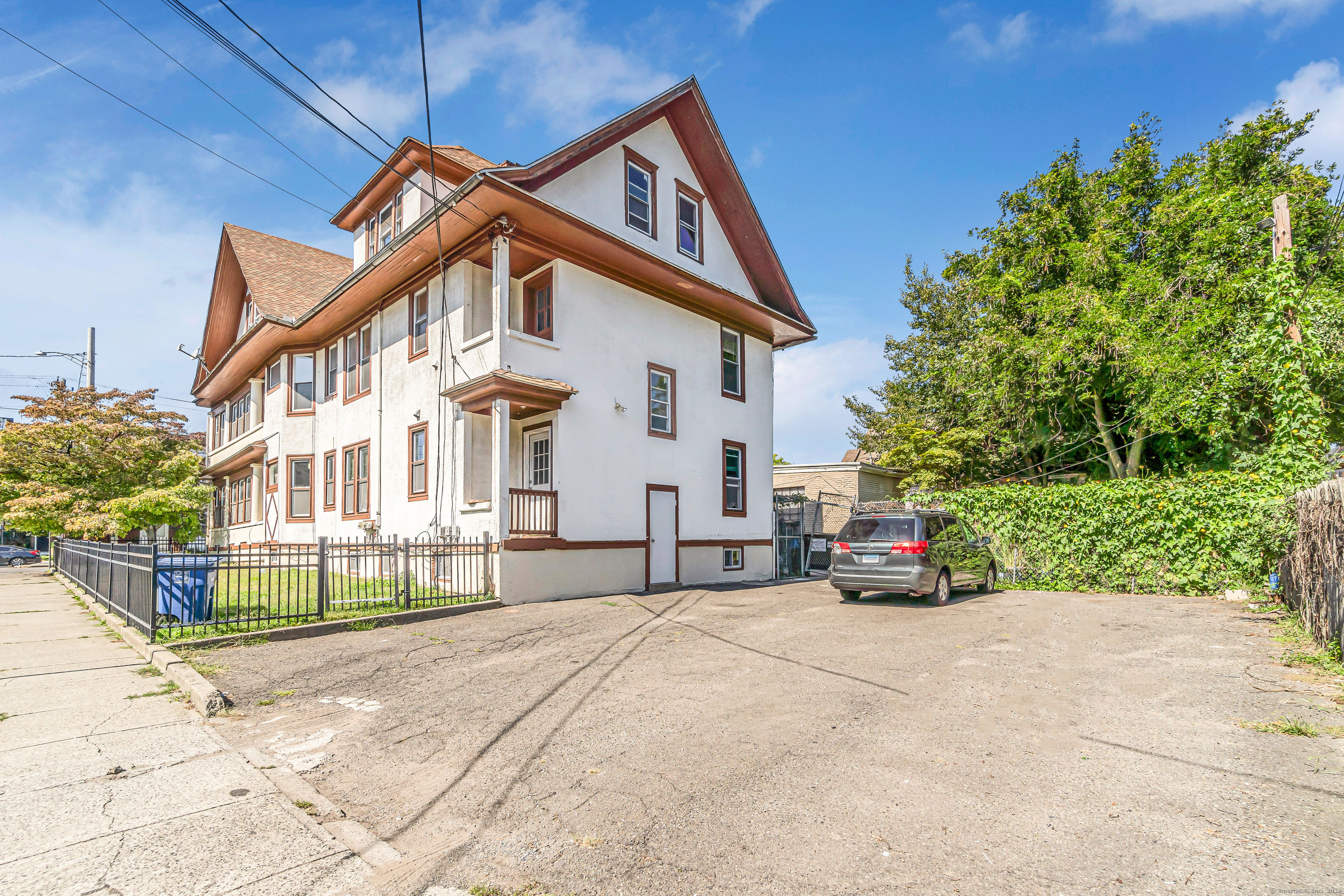 2679 Fairfield Avenue, Unit 2 Bridgeport, CT 06605 - Photo 22 of 22 a view of a house with a patio
