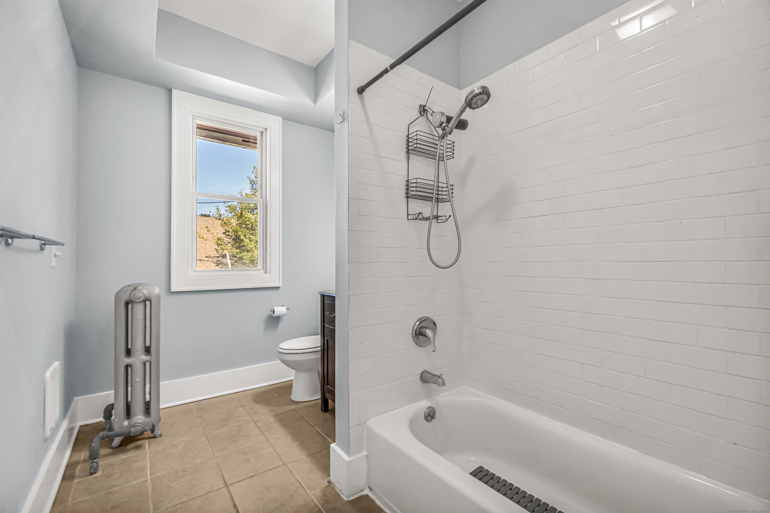 2679 Fairfield Avenue, Unit 2 Bridgeport, CT 06605 - Photo 7 of 22 a bathroom with a bathtub and shower