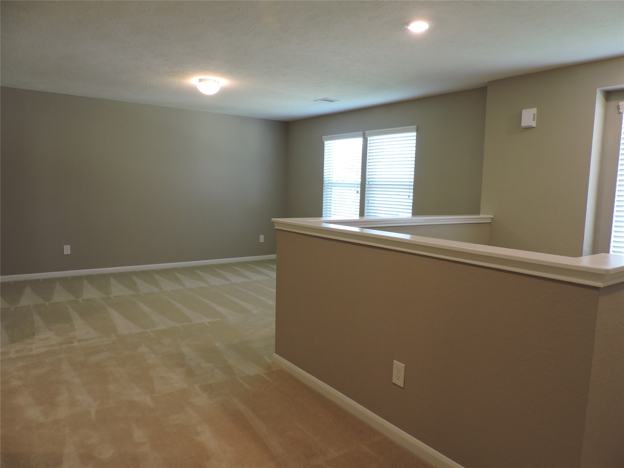 1102 Upton Court Conroe, TX 77304 - Photo 15 of 30 a view of an empty room with a window