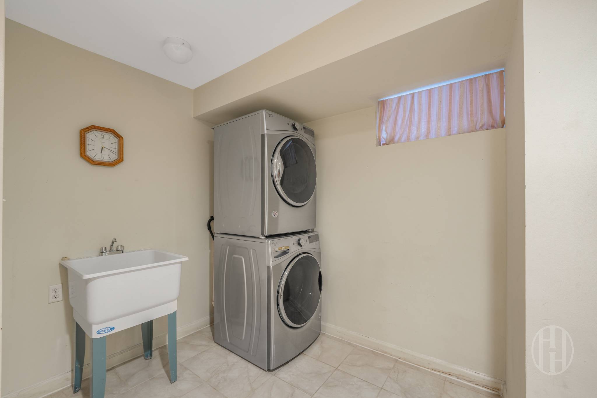 88-10 70th Road, Unit 1 Queens, NY 11375 - Photo 22 of 28 a utility room with dryer and washer