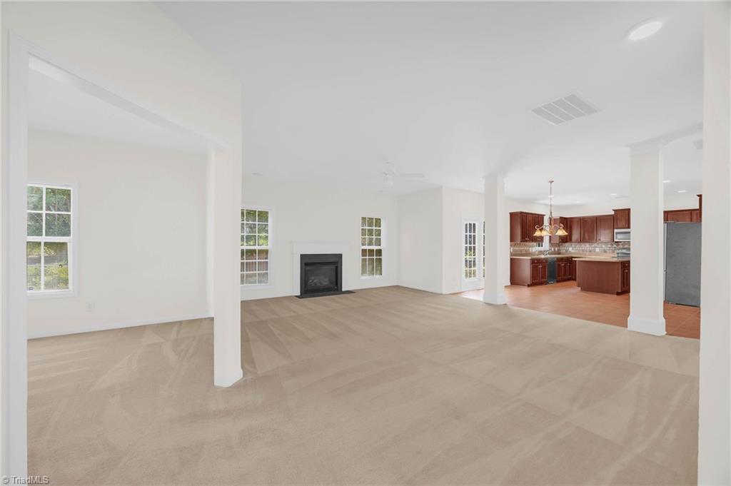 4802 Tradition Way Colfax, NC 27235 - Photo 13 of 37 View into Office, Den, and Kitchen