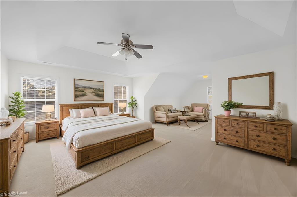 4802 Tradition Way Colfax, NC 27235 - Photo 14 of 37 Primary Bedroom with Sitting Area. Virtually Staged