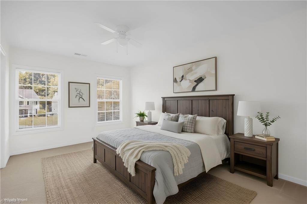 4802 Tradition Way Colfax, NC 27235 - Photo 20 of 37 2nd Bedroom with Private ensuite bath- Virtually Staged