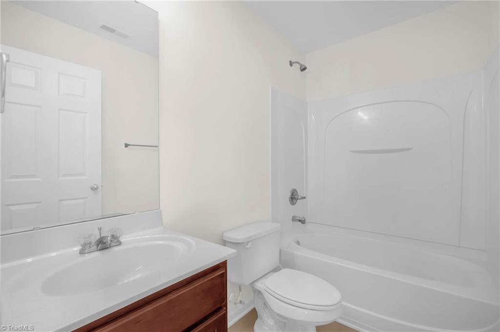 4802 Tradition Way Colfax, NC 27235 - Photo 22 of 37 2nd Bedroom Ensuite Bath