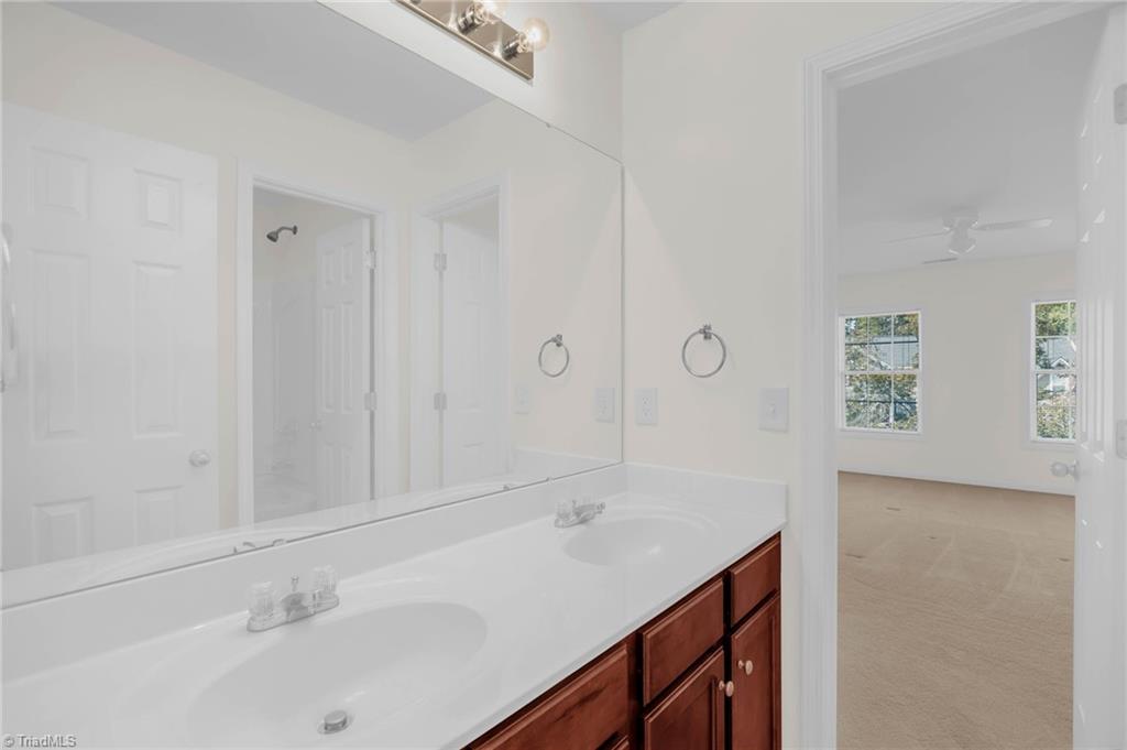 4802 Tradition Way Colfax, NC 27235 - Photo 25 of 37 Jack and Jill Bath with view of the 3rd Bedroom