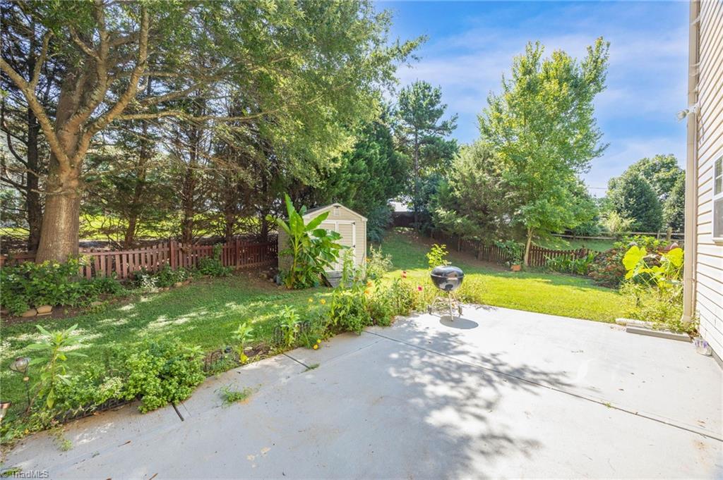 4802 Tradition Way Colfax, NC 27235 - Photo 29 of 37 Private Patio and Storage Shed