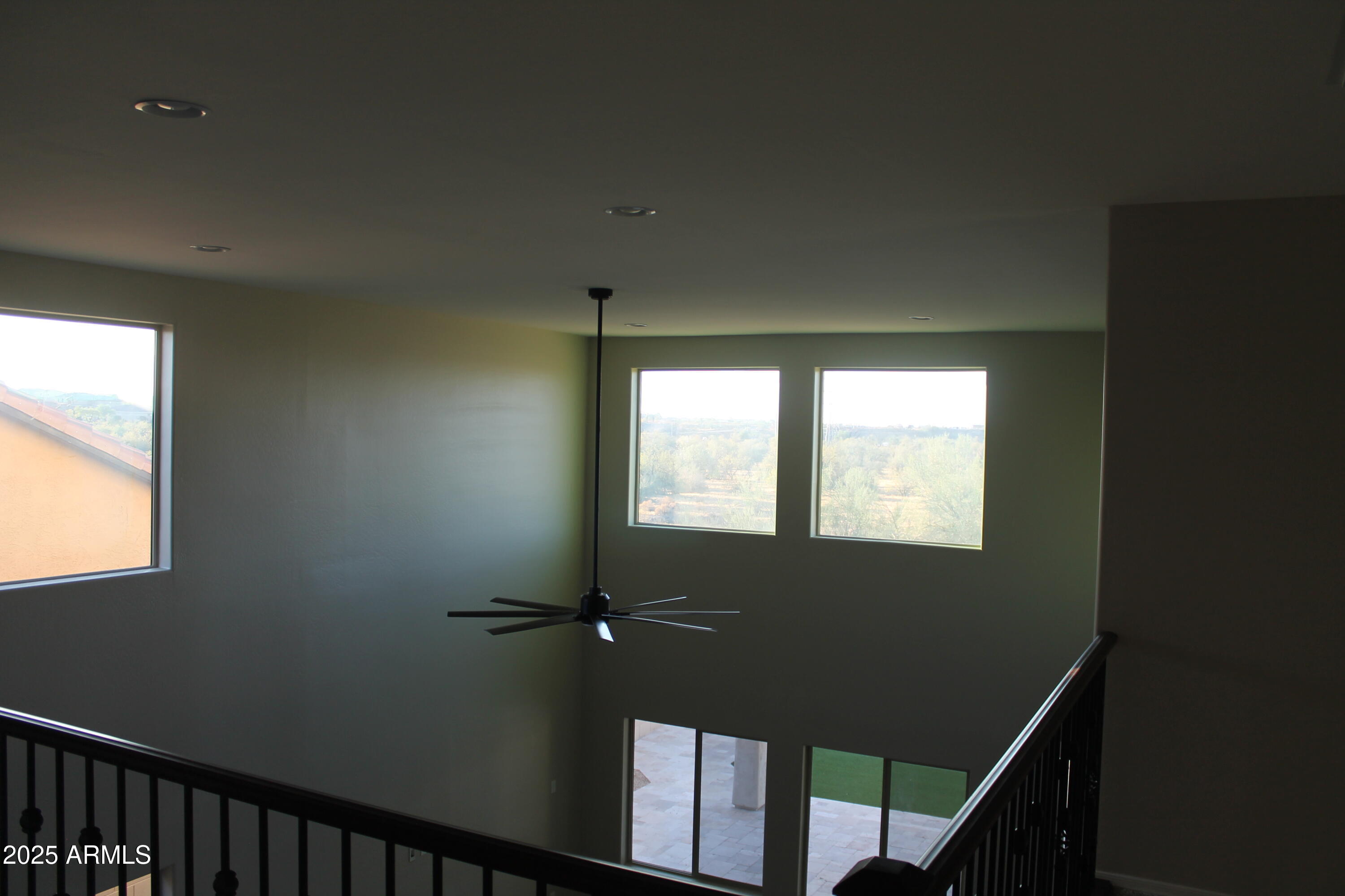 10847 West Nosean Road Peoria, AZ 85383 - Photo 7 of 11 a view of an empty room with a window