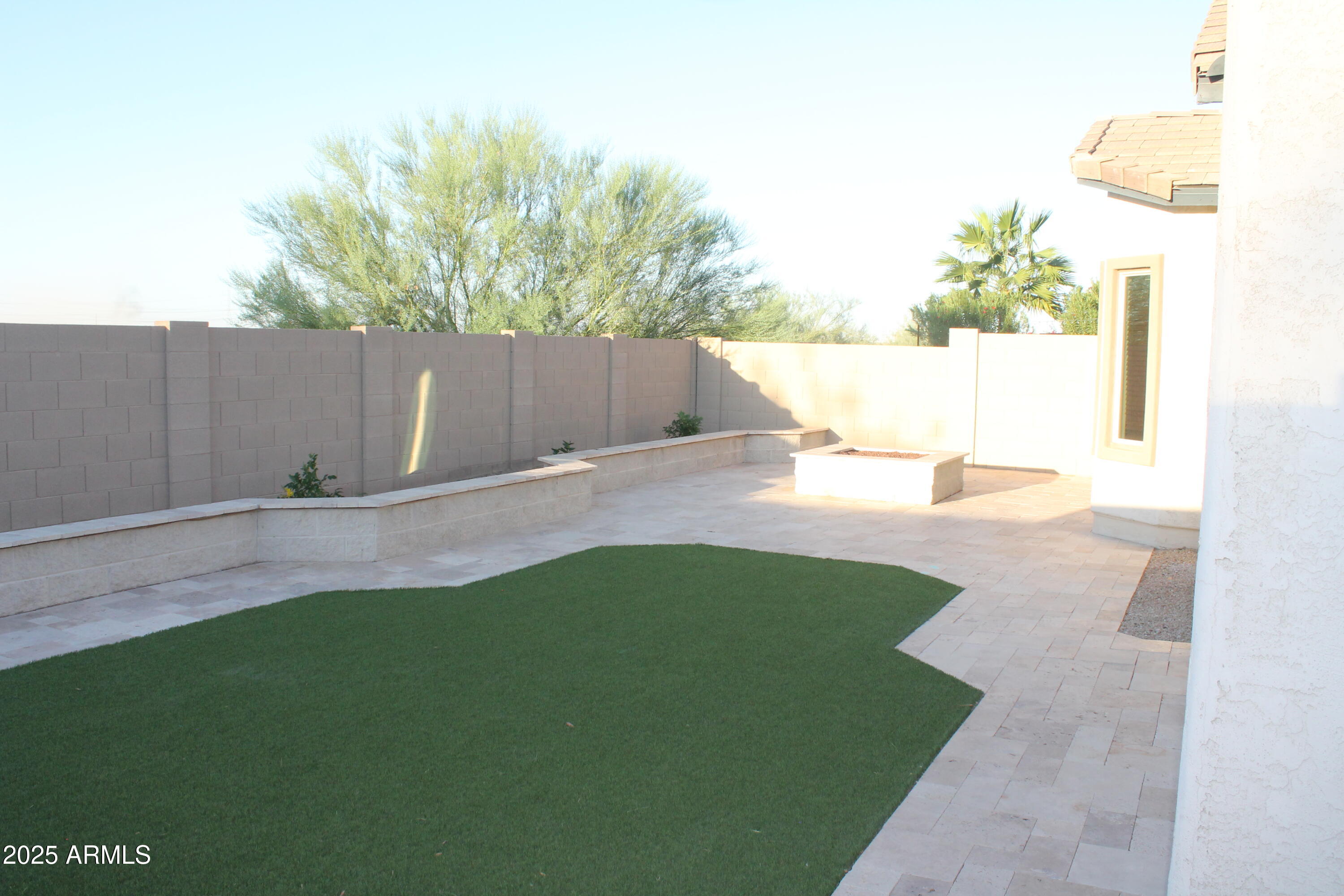 10847 West Nosean Road Peoria, AZ 85383 - Photo 10 of 11 a backyard of a house with lots of green space