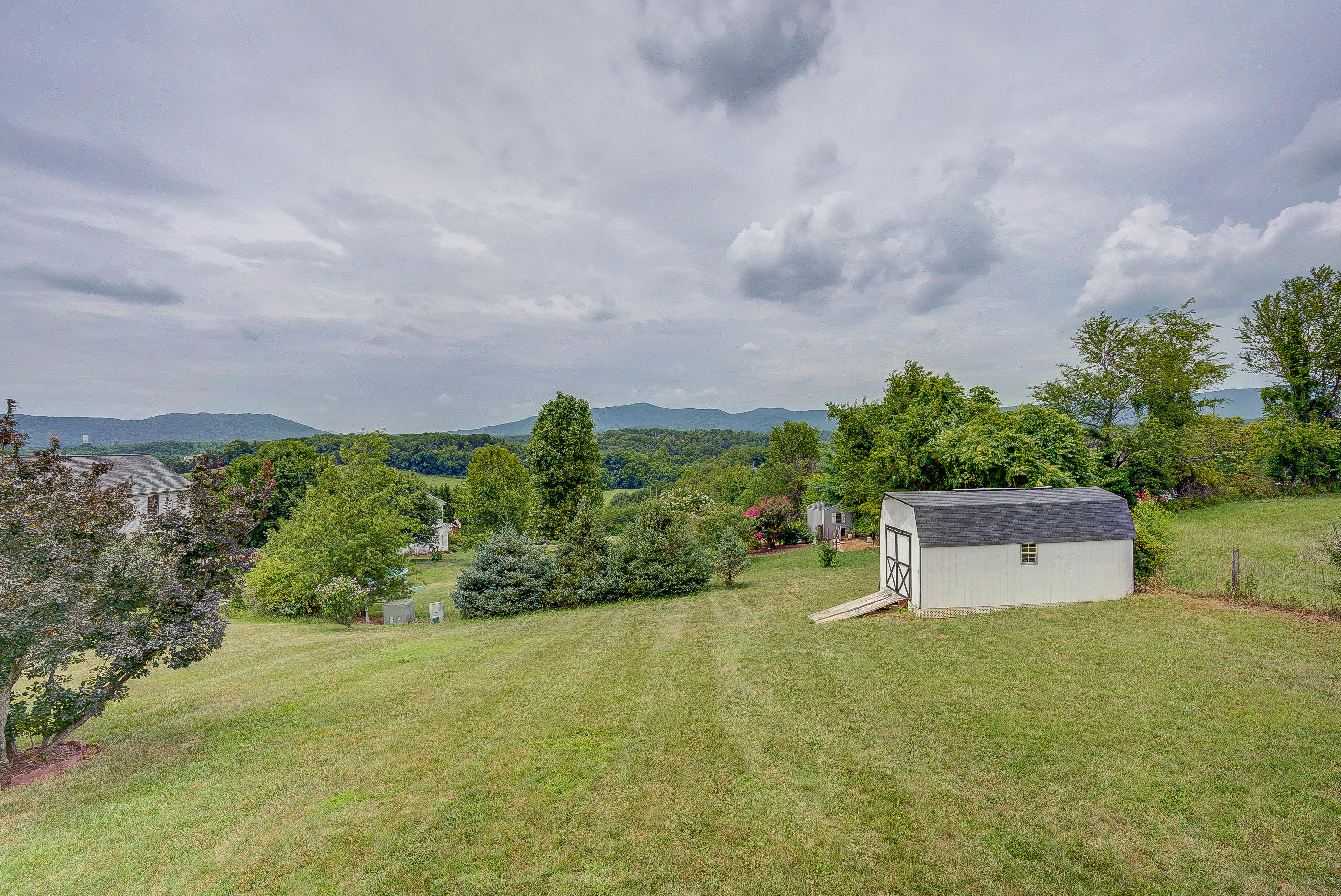 60 W Road Blue Ridge, VA 24064 - Photo 22 of 31 a view of a big yard with large trees