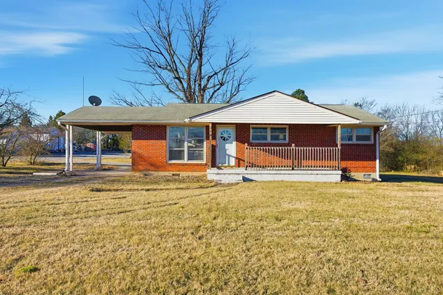 a front view of a house with swimming pool