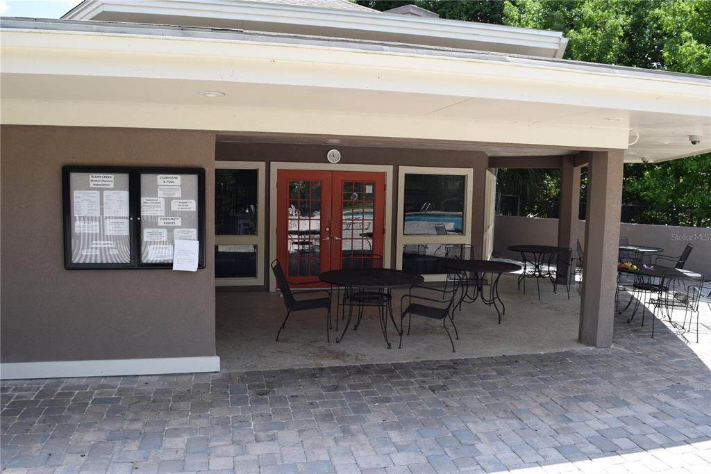 7976 48 Way Gainesville, FL 32653 - Photo 26 of 26 a view of a porch with chairs and a window