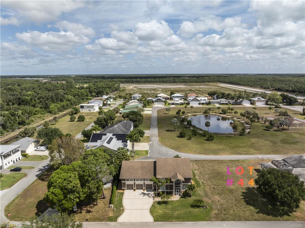 4072 Skyway Drive Naples, FL 34112 - Photo 5 of 11 a view of a city and lake